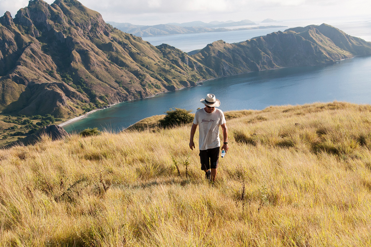 Man walking on top of Padar island, Komodo national park